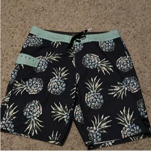 Rip Curl Men’s Black Swim Board Shorts with Mint Pineapple Print